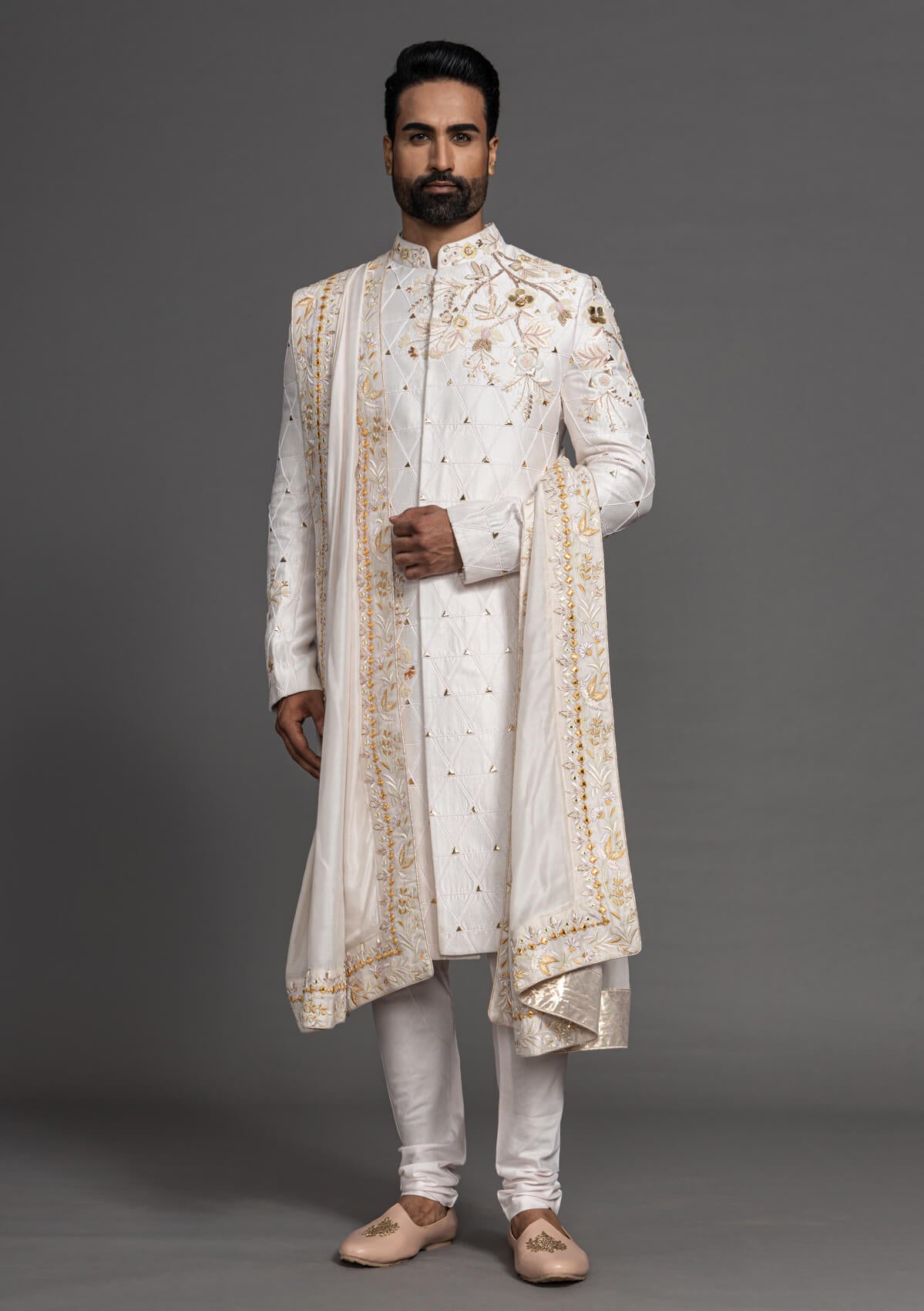 AMIRA Sherwani ensemble for a regal and sophisticated look.
